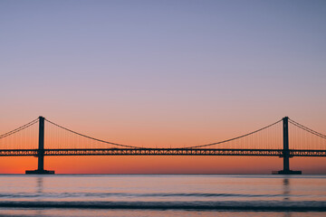 Fototapeta na wymiar ocean and bridge at sunset, kwang an li beach in Busan
