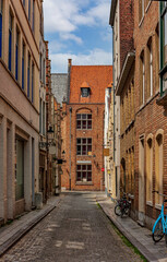 Obraz premium Old street in Bruges (Brugge), Belgium. Cityscape of Bruges. Typical architecture of Bruges