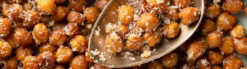 Close-up roasted chickpea with grated cheese banner panoramic