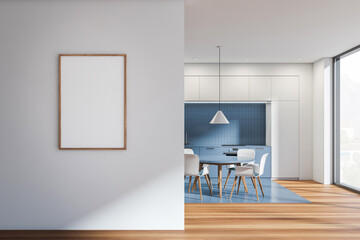 White and blue kitchen interior with table and chairs, window and mockup poster