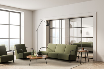 Bright living room interior with two armchairs, sofa, panoramic window