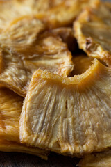 Close up of dried pineapple slice texture for design or background