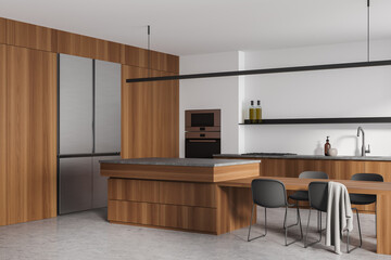 White kitchen set interior with table and chairs, kitchenware and fridge