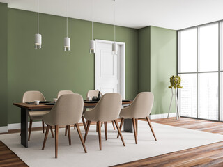 Corner view of green, beige and white dining room
