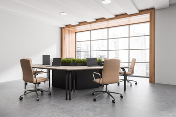 Corner view on bright office room interior with panoramic window