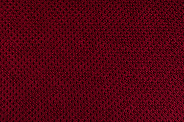 Burgundy knitted pattern textured background