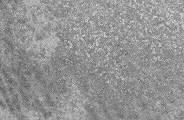 Grey grunge surface. Retro rusty wallpaper. Ancient cracked print. Grunge Dirty metal texture. Aged grainy splash.