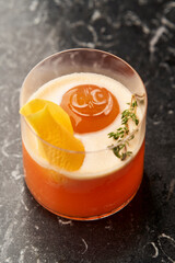 Fresh cocktail glass on marble table. Alcohol cocktail