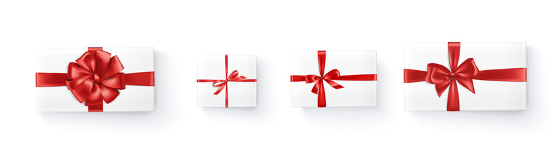 Realistic vector gift boxes with red ribbons isolated on white background. Holiday presents, top view illustration. Great for Christmas and birthday cards, shopping sale banners, gift certificates.