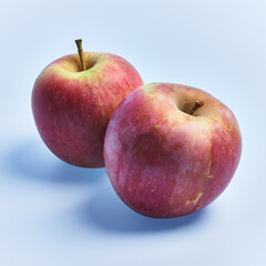  Group of red apples fruits over blue background