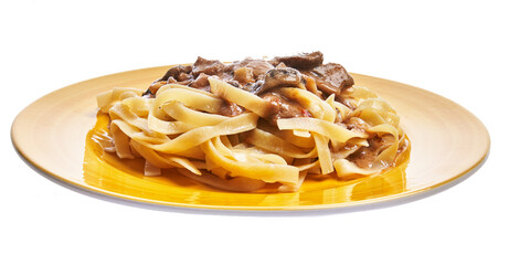  Plate of italian tagliatelle pasta with mushroom sauce isolated over white background