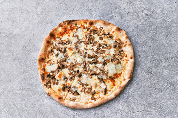  Delicious mushroom italian pizza on a concrete surface