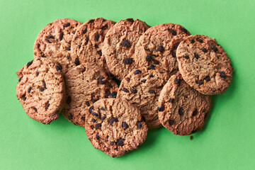  Delicious chocolate cookies on a green background