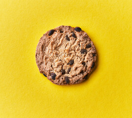  Delicious chocolate cookie on a yellow background