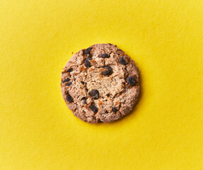  Delicious chocolate cookie on a yellow background