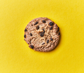 Delicious chocolate cookie on a yellow background