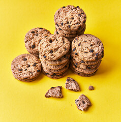  Delicious chocolate cookies on a yellow background