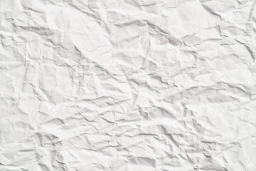 White crumpled paper texture with wrinkles. Damaged and torn sheet