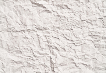 White crumpled paper texture with wrinkles. Damaged and torn sheet