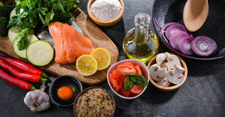 Fototapeta na wymiar Fresh food ingredients prepared for cooking on a kitchen table