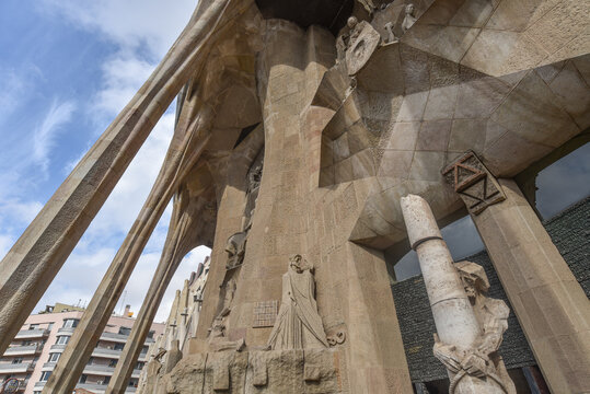 Barcelona, Spain - 22 Nov, 2021: Statues on the exterior of the Sagrada Familia designed by modernista architect Antoni Gaudi. Barcelona