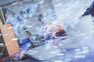 Double exposure of woman hands working on computer and data theme hologram drawing. Tech concept.