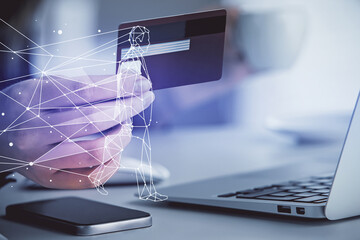 Double exposure of woman on-line shopping holding a credit card and creative drawing. e-commerce...