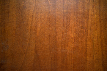The texture of the wooden countertop.Vintage mahogany with scratches. Wooden background.