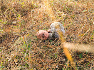 Apocalyptic world after the pandemic. Abandoned Broken Creepy baby doll