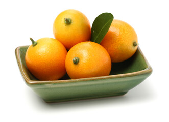kumquat on white background