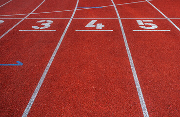 Fototapeta premium red lines whith numbers in a cross-country stadium