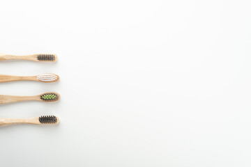 Bamboo toothbrushes as concept of sustainable, zero waste product. Copy space.