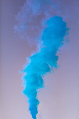 Naklejka premium Blue smoke on a blue background.