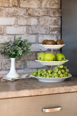 Still life with fruits in the kitchen