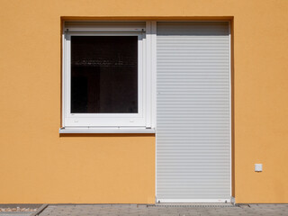 Obraz na płótnie Canvas House facade with door and window