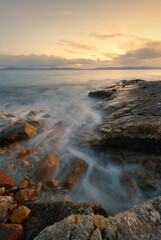 Beautiful seascape sunset scenery of rocky coast at wild atlantic way in county Galway, Ireland 