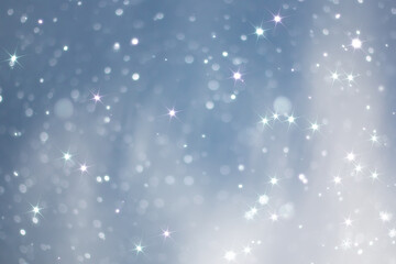 blue snowfall bokeh background, abstract snowflake background on blurred abstract blue