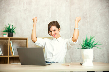 Excited caucasian woman sit at desk feel euphoric win online lottery, happy woman overjoyed get mail at laptop being promoted at work, biracial girl amazed read good news at computer