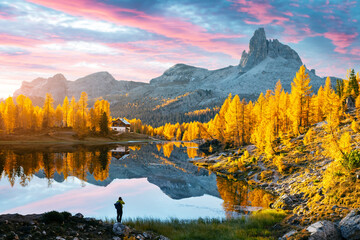 Picturesque view on Federa Lake in sunrise time. Autumn mountains landscape with Lago di Federa and...