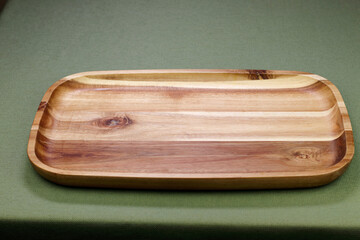 Rectangle Acacia Wood Serving Tray on a Green Table Cloth