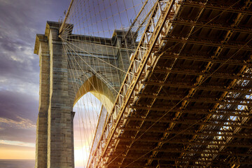 Fototapeta premium View Brooklyn Bridge with beautiful sunset in New York City