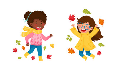 Kids playing outdoors in autumn set. Happy girls throwing colorful leaves cartoon vector illustration