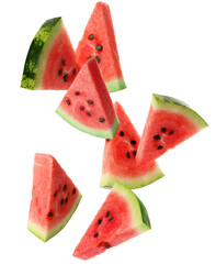 Slices of delicious ripe watermelon falling on white background
