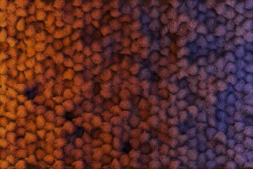 Soft honeycomb, fluffy thread of yarn. Background abstract minimalistic knitted texture with many...