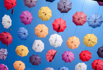 Fototapeta na wymiar Colorful umbrellas against blue sky, Turkey