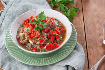 Eggplant, pepper and parsley salad with garlic and olive oil