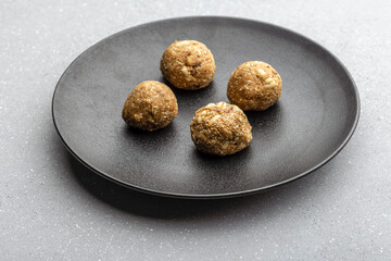 Gajak or til patti is a dry sweet cake - made of sesame seeds, ground nuts and jaggery, consumed in India  especially in winter during Makar Sankranti and Lohri festival