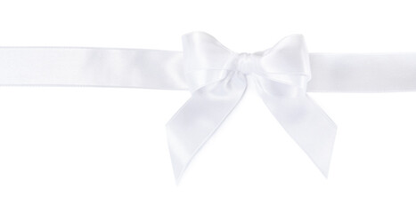 Satin ribbon with bow on white background, top view