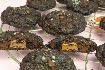 chewy chocolate cookie with chocolate drops and caramel