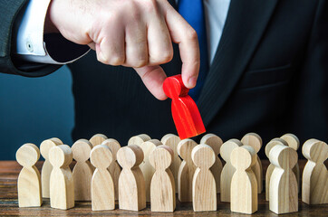 Man pulls the red man out of the crowd. Different, special. Infected. Intruder detection....